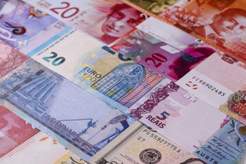Paper money, banknotes of different countries as a business background. Paper money and cash