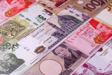 Paper money, banknotes of different countries as a business background. Paper money and cash