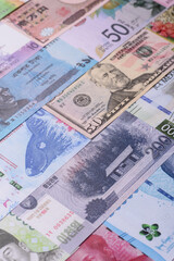 Paper money, banknotes of different countries as a business background. Paper money and cash
