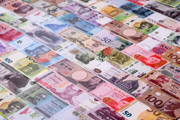 Paper money, banknotes of different countries as a business background. Paper money and cash