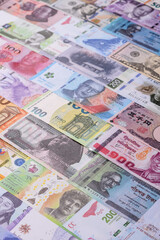 Paper money, banknotes of different countries as a business background. Paper money and cash