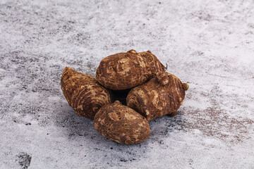 Brown topinambur roots for cooking