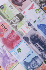 Paper money, banknotes of different countries as a business background. Paper money and cash