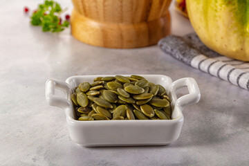 Fresh green pumpkin peeled seeds
