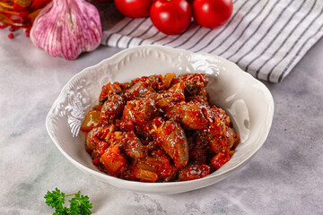 Roasted chicken hearts with vegetables