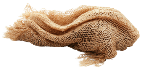Wrinkled, beige netting with frayed edges on a black background