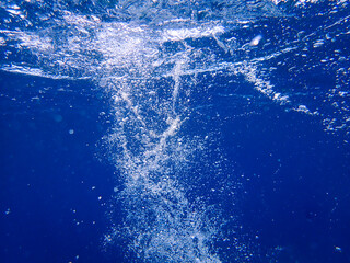 Bubbles under the sea in the crystal clear green sea water. Mediterranean bubbles. Real image very suitable for backgrounds, Rising Bubbles in Deep Underwater, Under with bubble. Great for background.