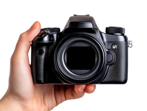 Hand holds a modern, black DSLR camera against a dark backdrop
