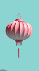 Obraz premium Pink Lantern Floating Against a Turquoise Background.