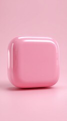 Pink square object on pink background, studio shot.