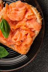 sandwich salmon smoked fish open sandwich delicious fresh portion size natural product tasty snack fresh delicious gourmet food background on the table rustic top view copy space pescetarian diet