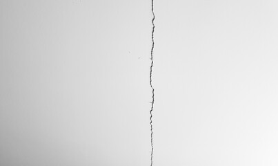 A crack in the plaster, a cracked white wall. A whitewashed wall, a damaged ceiling. A cracked white concrete wall.