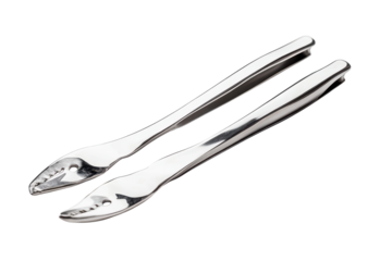 Close up of two silver crab crackers against transparent background