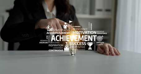 A business professional illustrates the concepts of achievement and motivation, emphasizing...