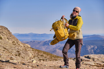 Woman walking alone in the mountains