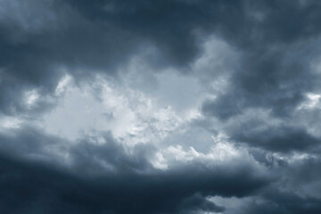 Dramatic storm fluffy cloud sky. Rainy season. Cloudscape background. Pollution, PM 2.5, Carbon dioxide and environment problems concept. Halloween, scary scene thunderstorm and rainy season backdrop.