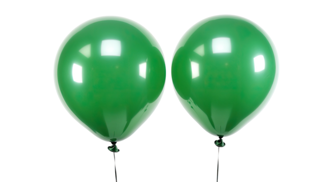 Two vibrant green balloons floating against a solid, dark background