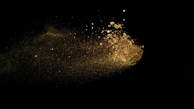 Freeze Motion Shot of Flying Soil , Isolated on Black Background - Powered by Adobe
