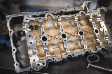 Detailed view of an engine component, illustrating the intricate internal parts with precision.