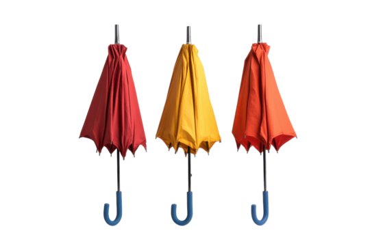 Three closed umbrellas in red yellow and orange on transparent