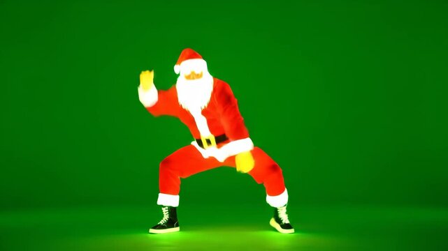 Neon Santa Breakdancing on Green Screen - A neon-style Santa Claus in a breakdancing pose is shown against a vibrant green chroma key background.