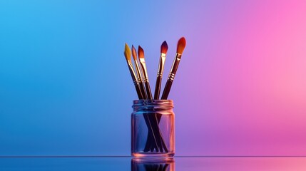 Glass jar filled with paintbrushes. the jar is placed on a reflective surface, and the background is a gradient of blue and pink.