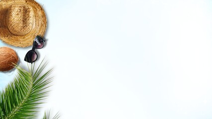 Summer Beach Flat Lay with Straw Hat, Sunglasses, Palm Leaves and Coconut on Light Blue Background. beach flat lay objects in summer vacation and summer concept. beach accessories, travel background.