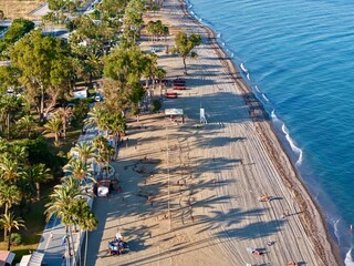 aerial view of the coast with beach and promenade with palms in San Pedro de Alcántara in beautiful light, Malaga, Costa del Sol, Andalusia, Spain © keBu.Medien