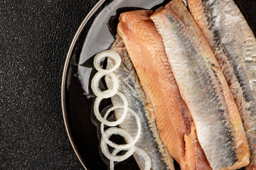 Herring fillet fish fresh seafood portion size natural product tasty snack fresh delicious gourmet food background on the table rustic top view copy space pescetarian diet