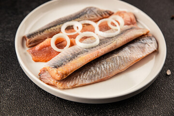 Herring fillet fish fresh seafood portion size natural product tasty snack fresh delicious gourmet food background on the table rustic top view copy space pescetarian diet