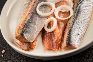 Herring fillet fish fresh seafood portion size natural product tasty snack fresh delicious gourmet food background on the table rustic top view copy space pescetarian diet