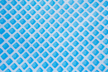 Empty blue inflatable pool with geometric plastic texture pattern