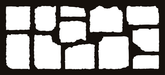 Fototapeta premium White torn paper fragments on dark background vector