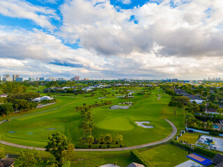 Coral Ridge Country Club. Aerial photo of golf landscape and beautiful clouds sunset sky