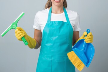 Woman in Cleaning Uniform Holding Tools – Concept of Housekeeping, Hygiene, and Domestic Work