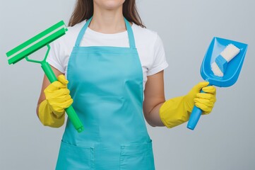 Woman in Cleaning Uniform Holding Tools – Concept of Housekeeping, Hygiene, and Domestic Work