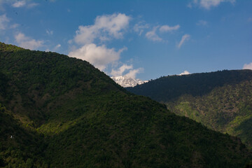Naklejka premium clouds over the mountains