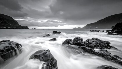 Gray seascape with rocky shore
