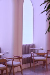 This Cozy Contemporary Cafe Interior features Stylish Seating, creating an inviting atmosphere