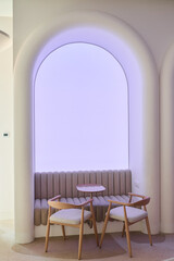 An Inviting and Modern Minimalist Seating Area Enhanced by Soft and Warm Lighting