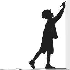 Boy drawing with chalk silhouette