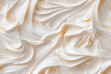 Fototapeta premium Seamless pattern of creamy white frosting or whipped cream swirls. Food texture background for dessert, bakery, or culinary design.