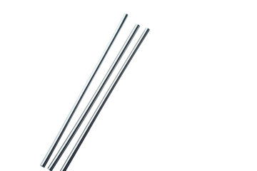 Three slender, parallel, metallic rods against a stark, black background