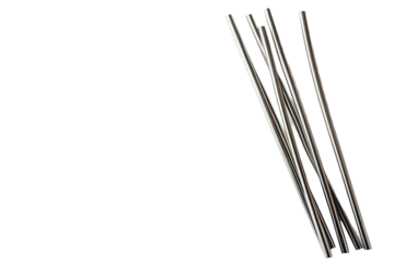 Angled bunch of silver-tone, long, thin, metal rods against a black backdrop