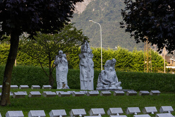 Statues in the cemetery of the Vajont victims in Longarone, Italy