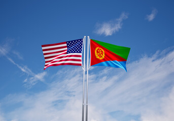 flags of  Eritrea and United States of America over blue sky background.