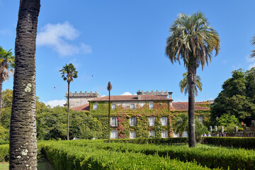 Scenic view of manor house and gardens in Castrelos Park