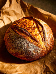 Rustic sourdough bread with a golden crust and artisan scoring
