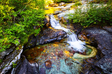 Scenic view of Ptarmigan creek on Iceberg lake trail in Glacier National Park