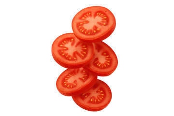 Fototapeta premium Fresh tomato slices falling, creating a dynamic visual for healthy cooking and raw food concepts